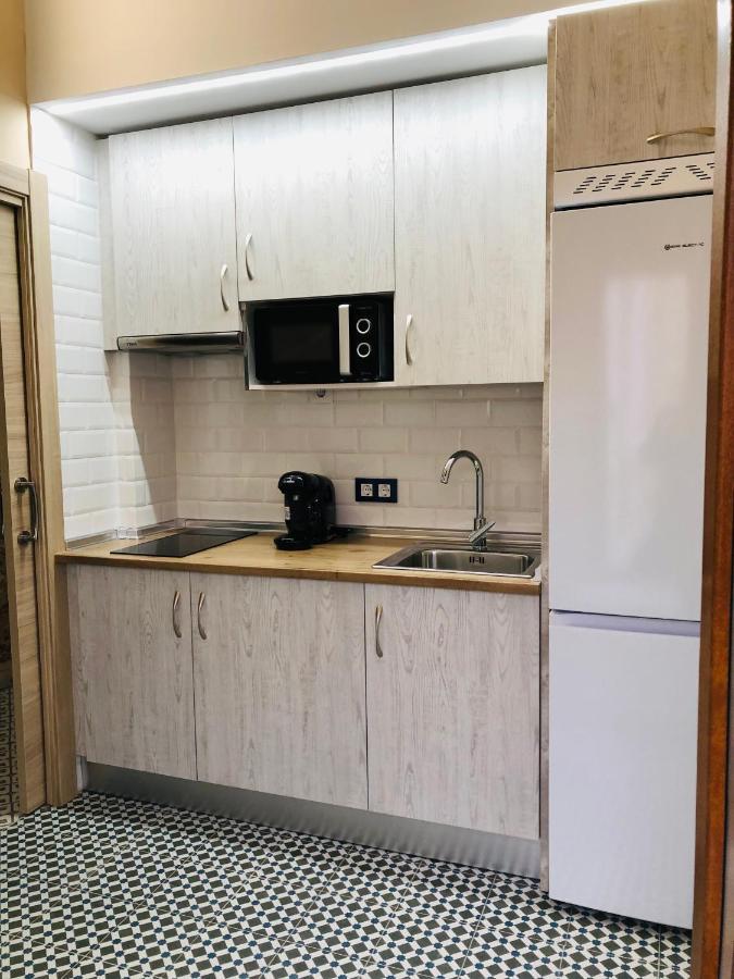 Al-Qazeres Suites Caces Exterior foto